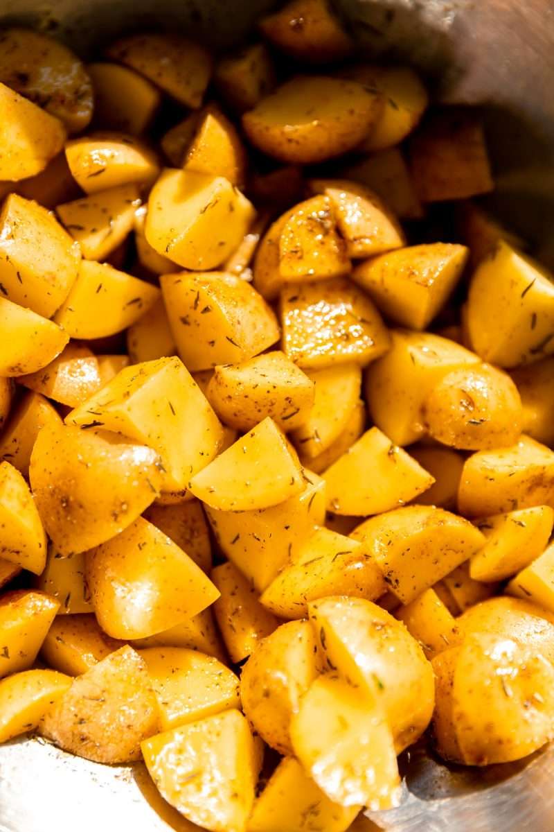 Diced potatoes tossed with olive oil and dried thyme.
