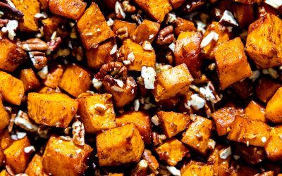A close-up photo of maple pecan roasted sweet potatoes.