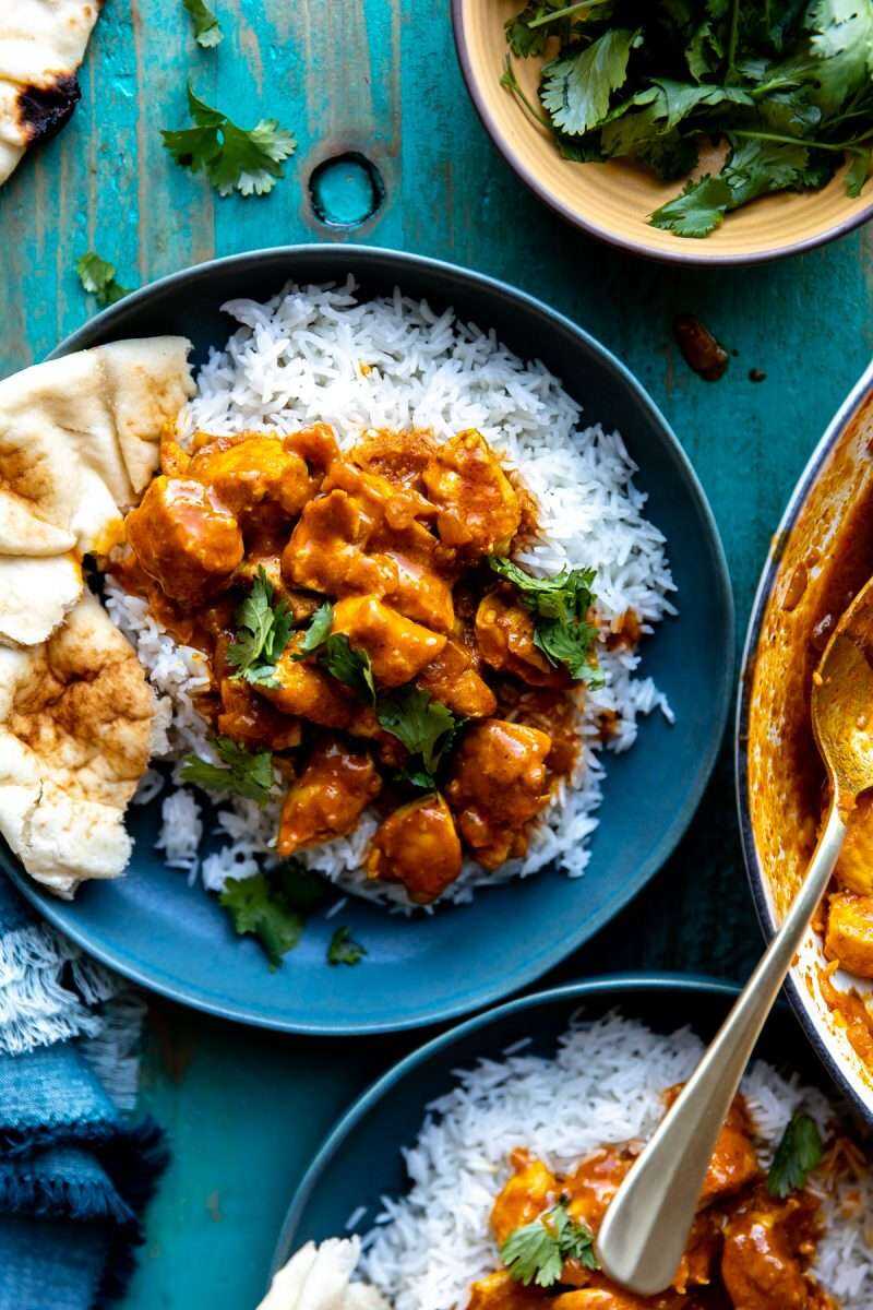 Easy Coconut Chicken Curry served over white rice with naan bread.