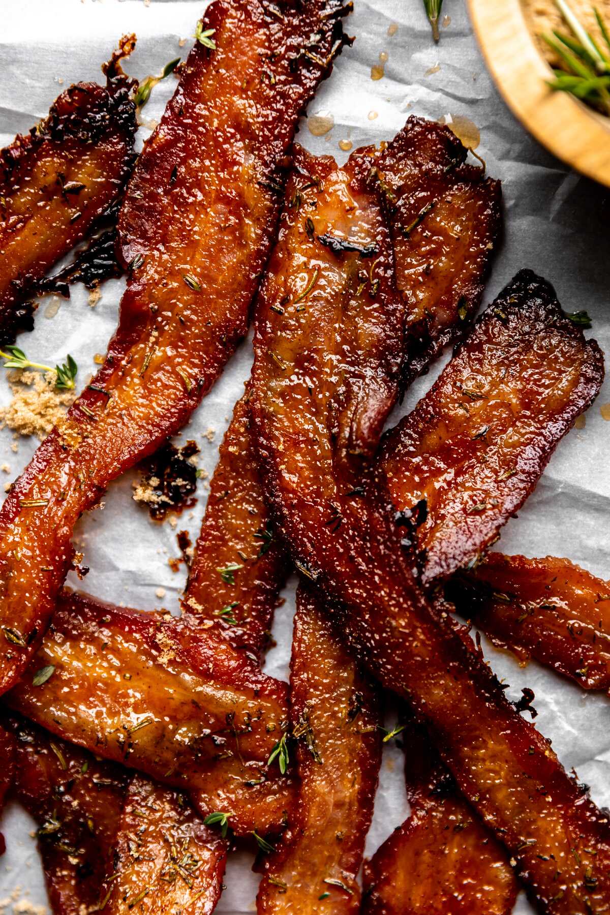 An up-close photo of herb candied bacon.