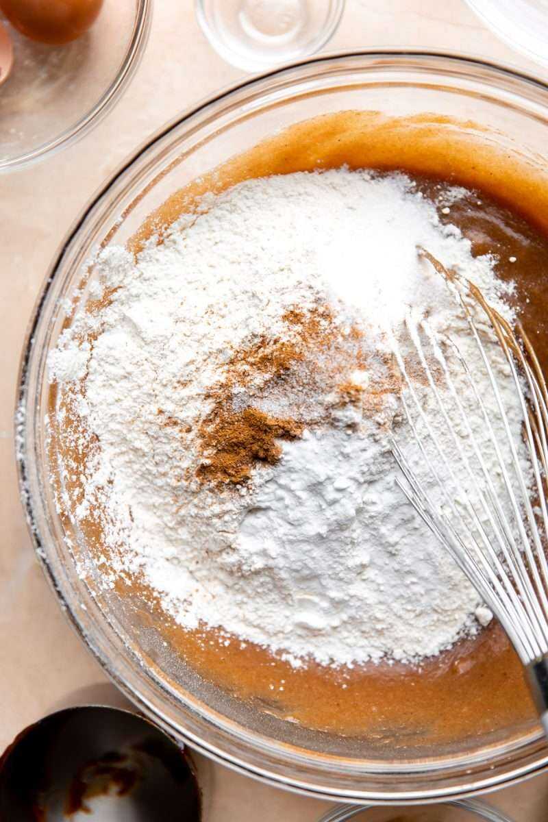 The dry ingredients added into the mixing bowl. 