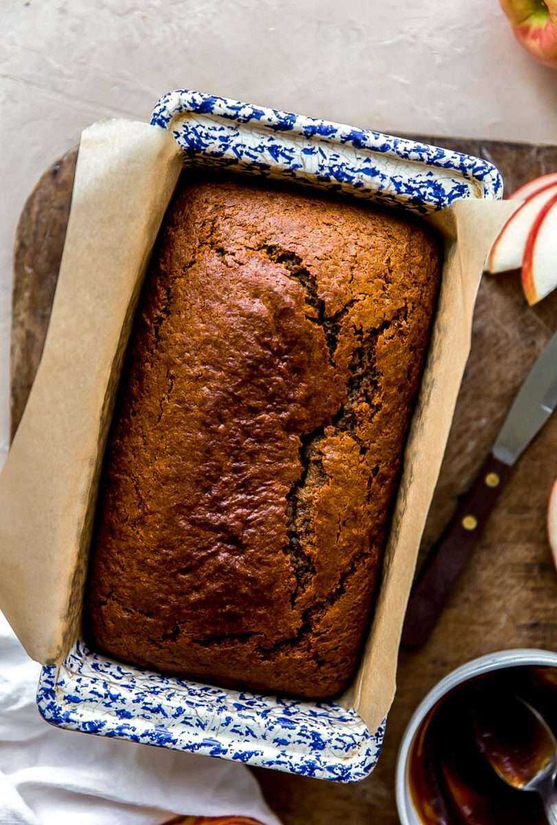 A loaf of spiced apple butter bread before being sliced.