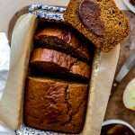 Spiced Apple Butter Bread that has been sliced and smeared with apple butter.
