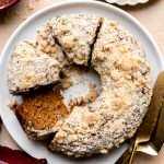 Apple Butter Coffee Cake on a platter with slices around.