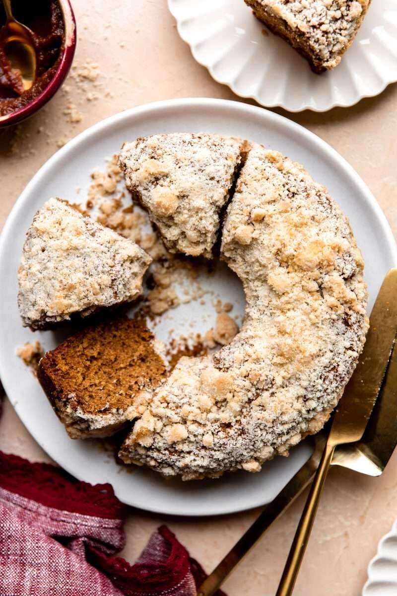 Apple Butter Coffee Cake on a platter with slices around.