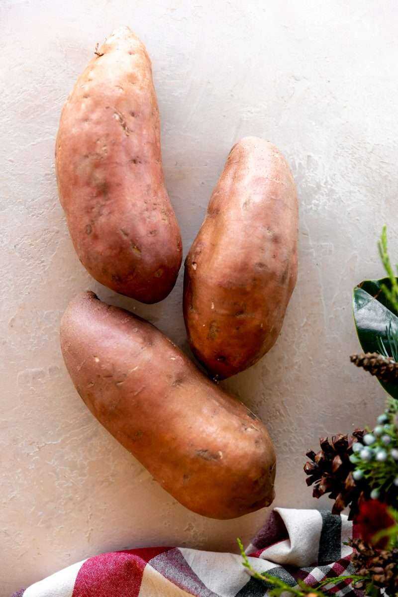Sweet potatoes before being peeled and cubed.