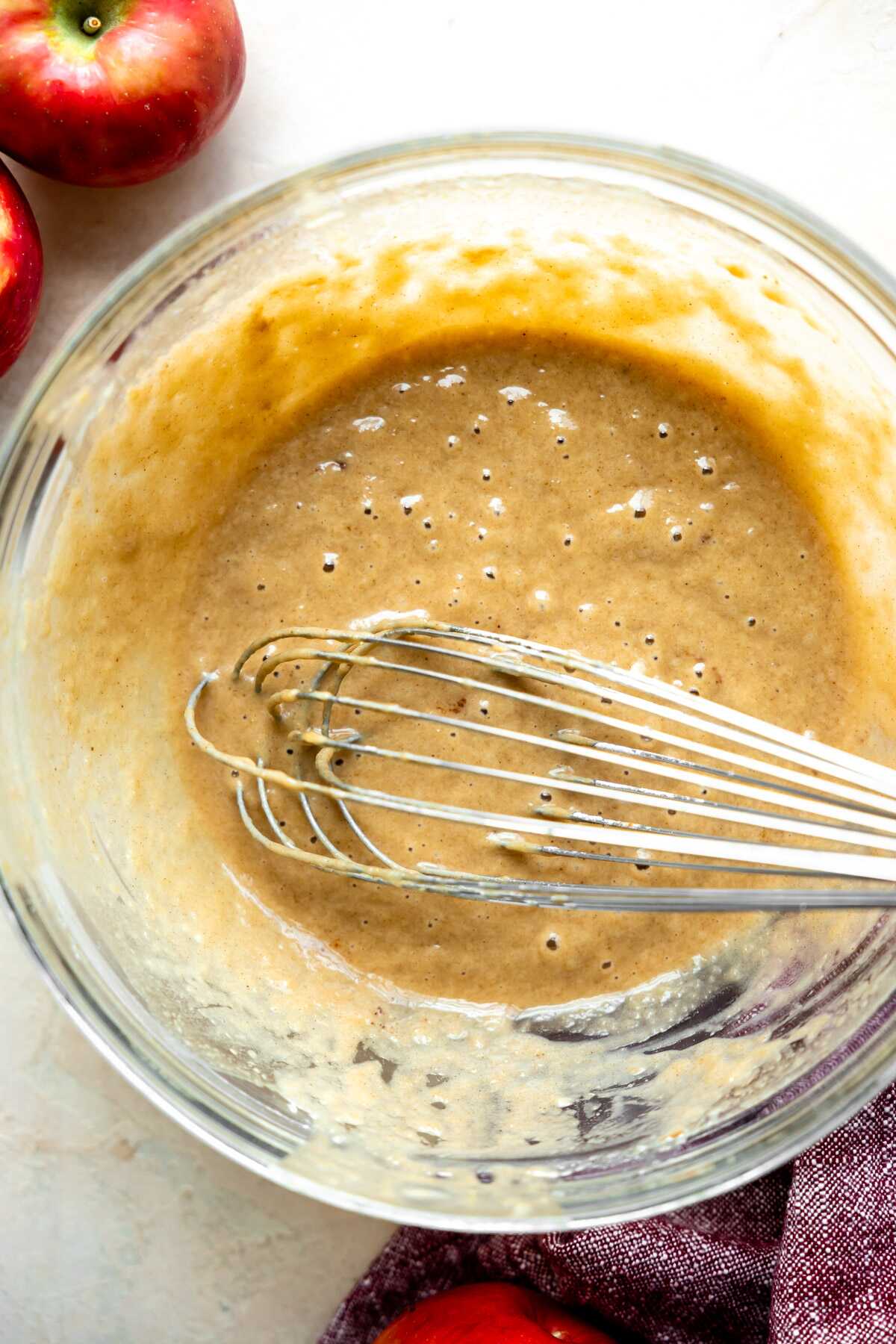 Apple cider donut batter in a bowl.