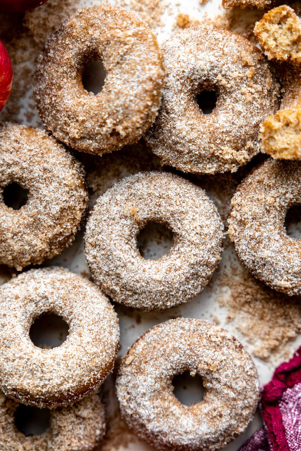A close-up photo of baked apple cider donuts. 