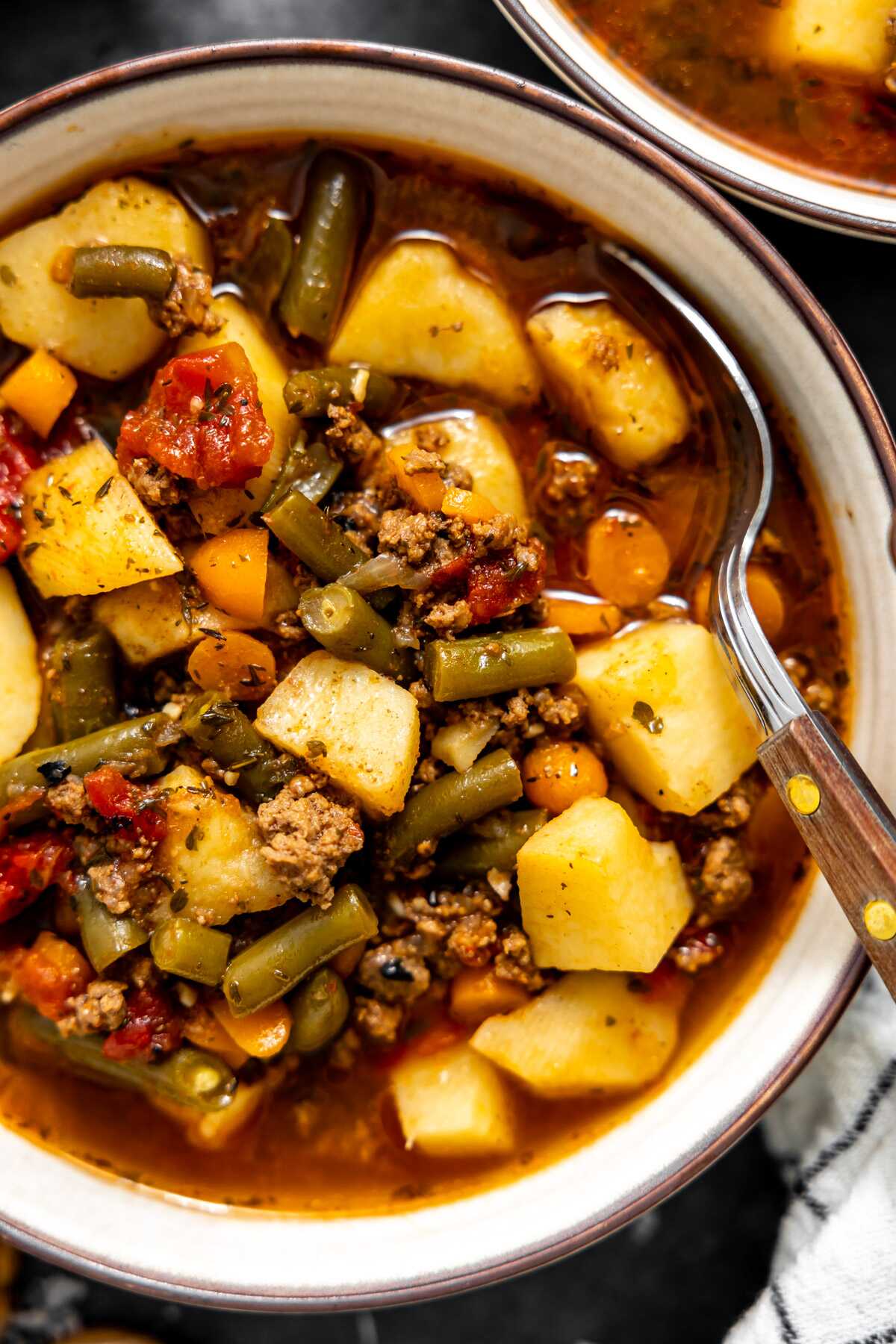 A close-up photo of a bowl of hamburger soup