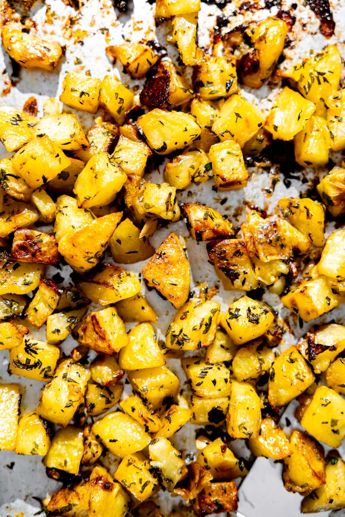 Garlic Herb Roasted Potatoes on a sheet pan. 