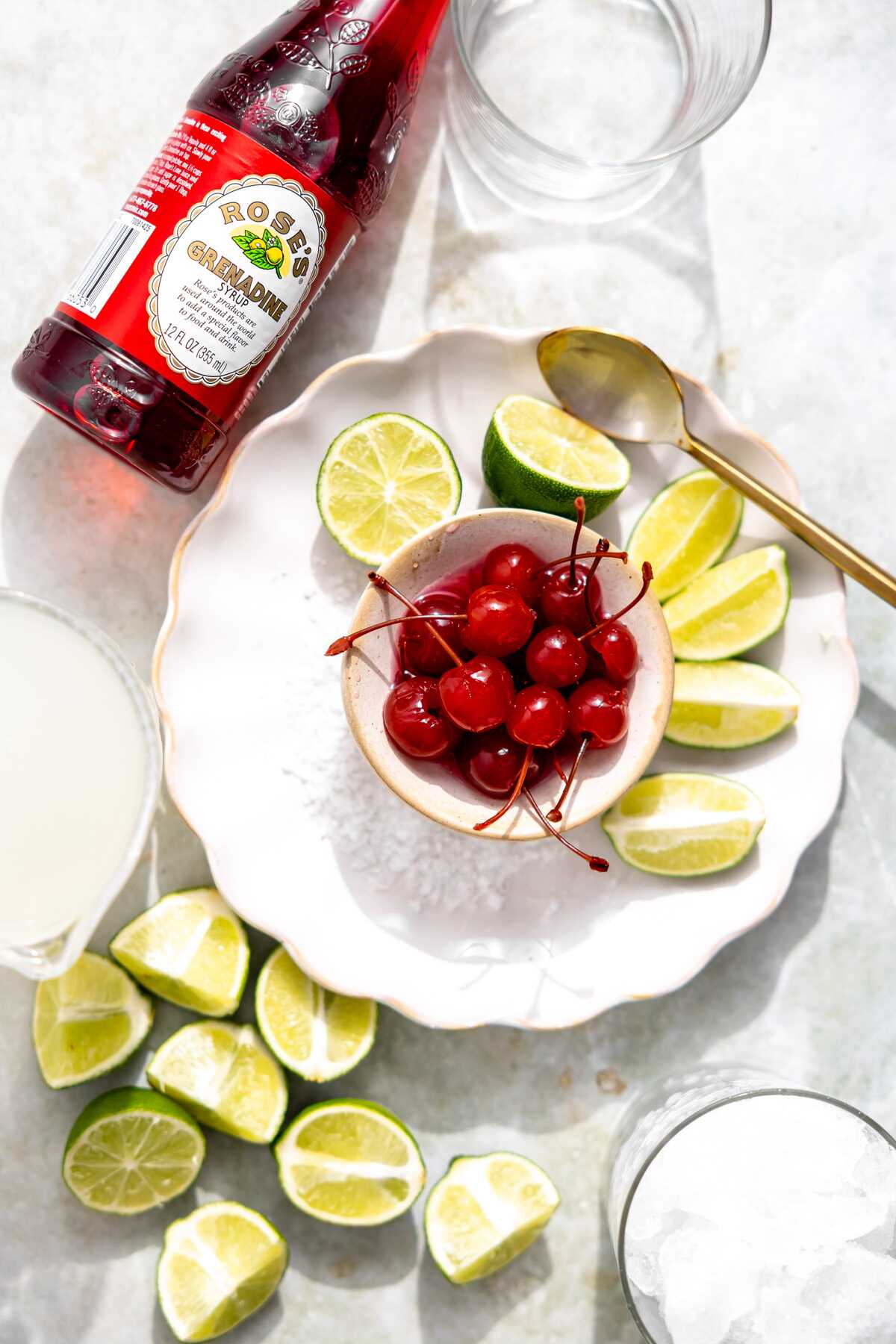 An ingredient photo of the cherry limeade margarita ingredients. 