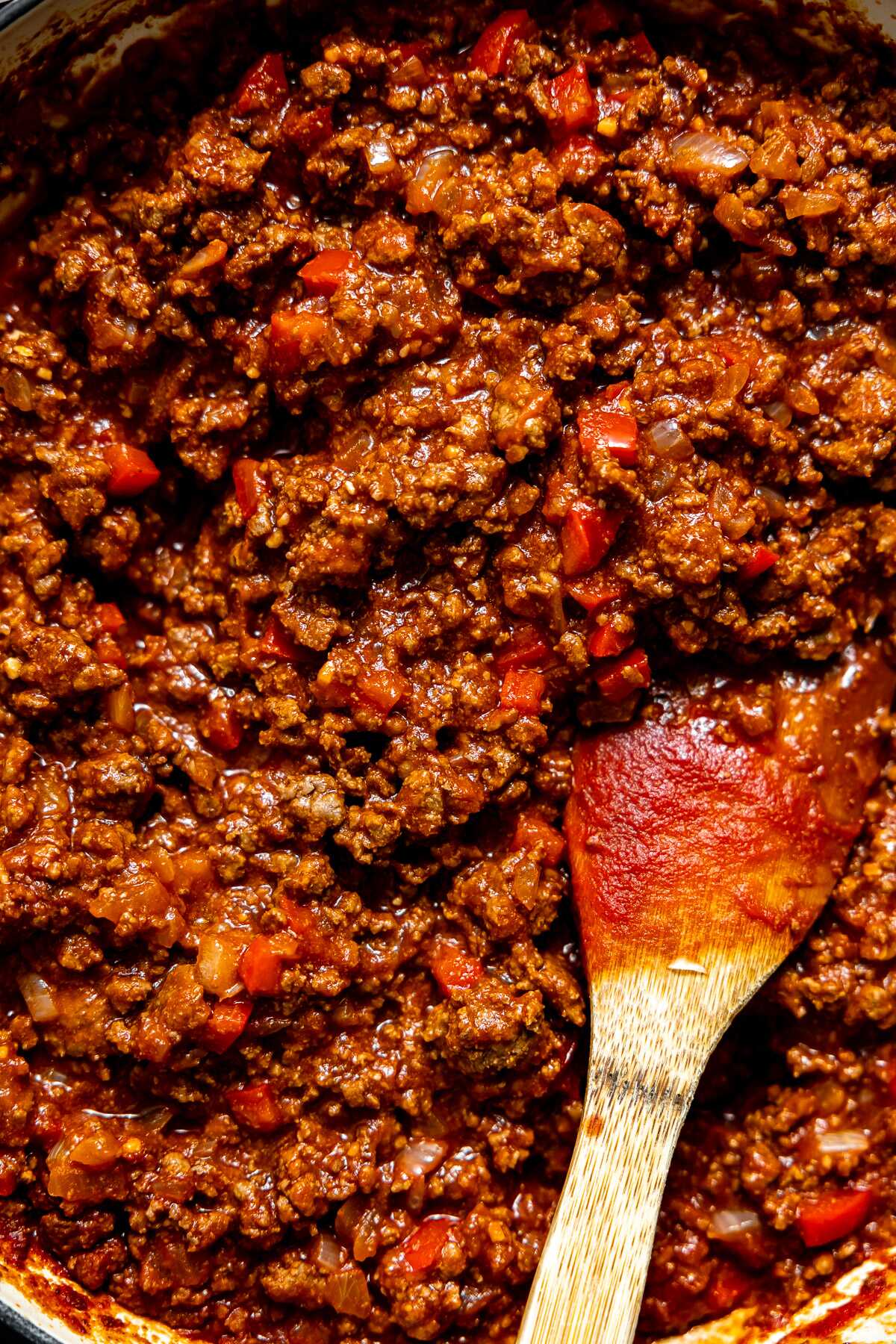 Simmered sloppy joe filling in a skillet. 