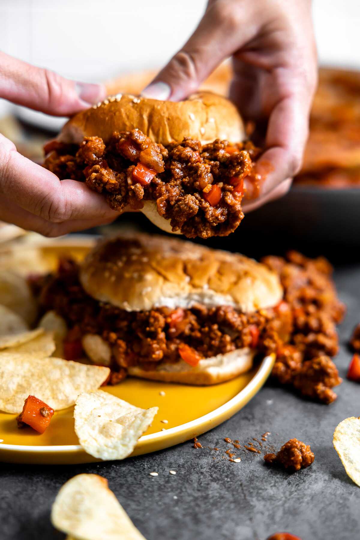 A sloppy joe being lifted away. 