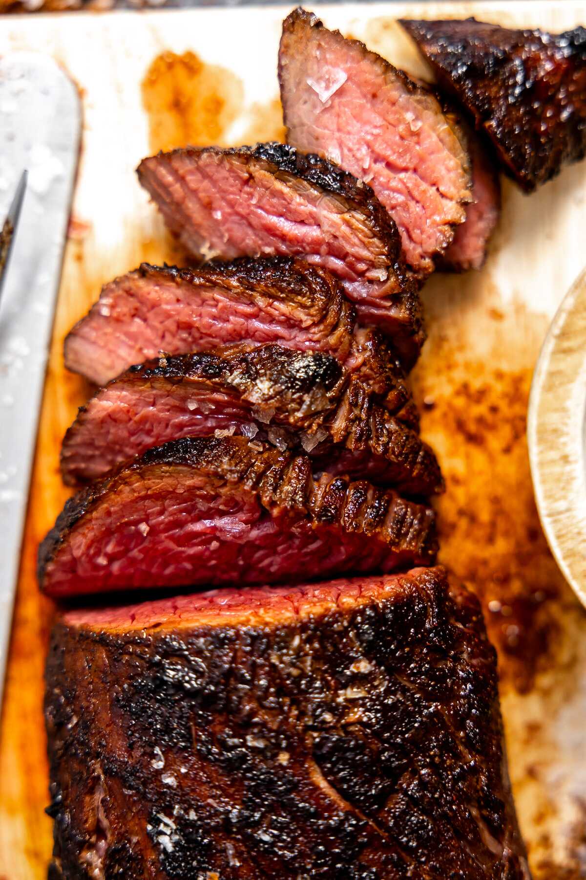 A close-up photo of a sliced tri-tip.