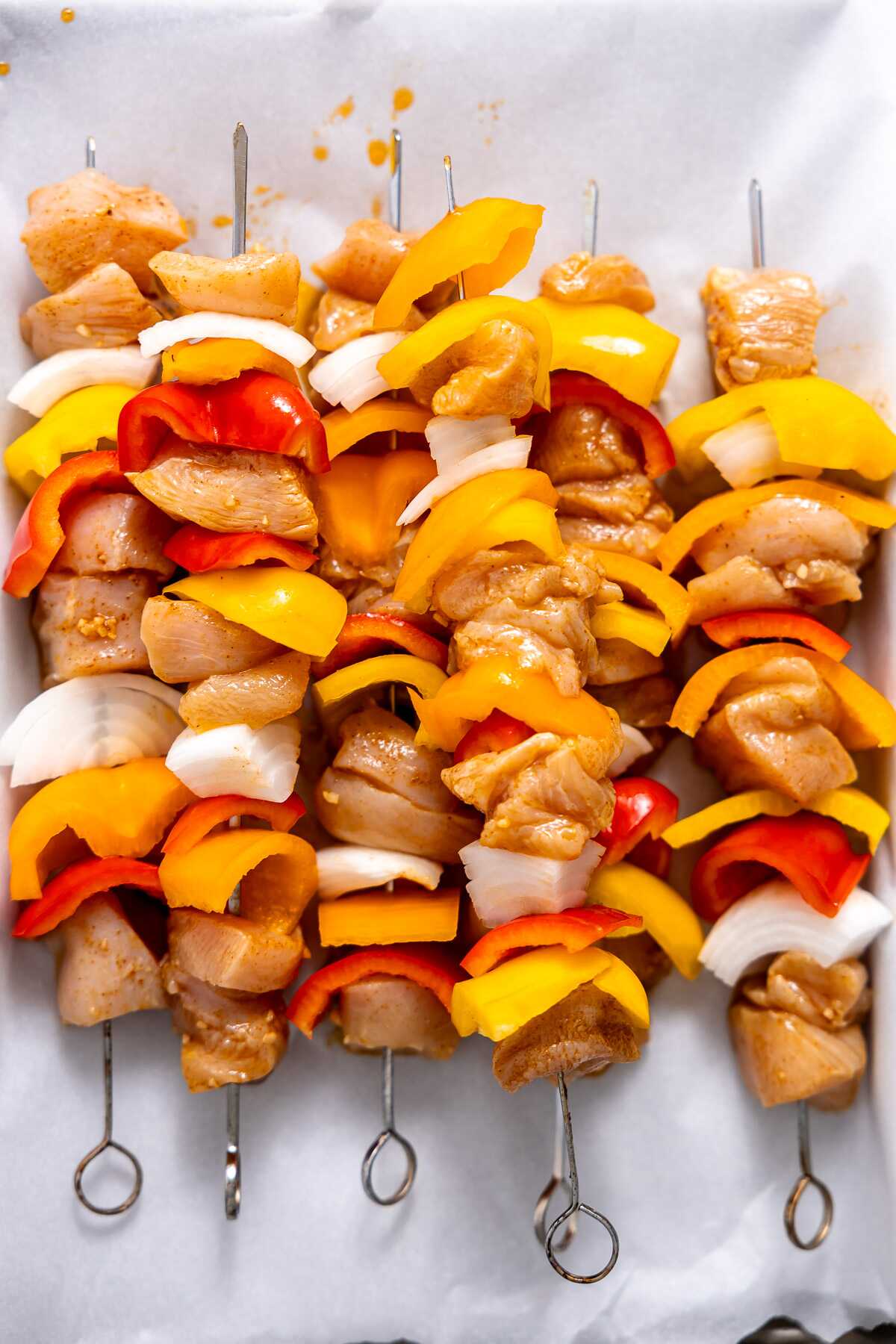 Assembled chicken fajita kabobs ready for the grill. 