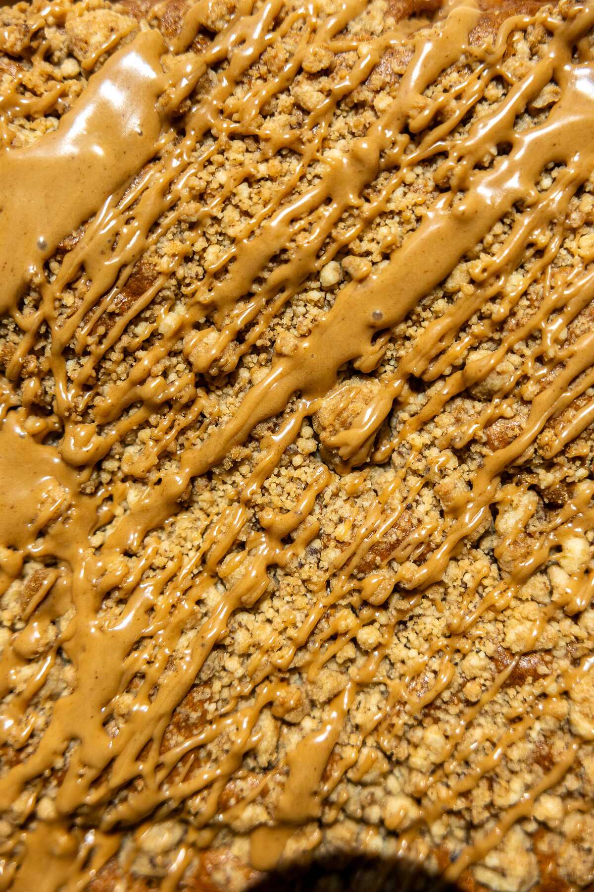 Glaze drizzled over the espresso coffee cake. 