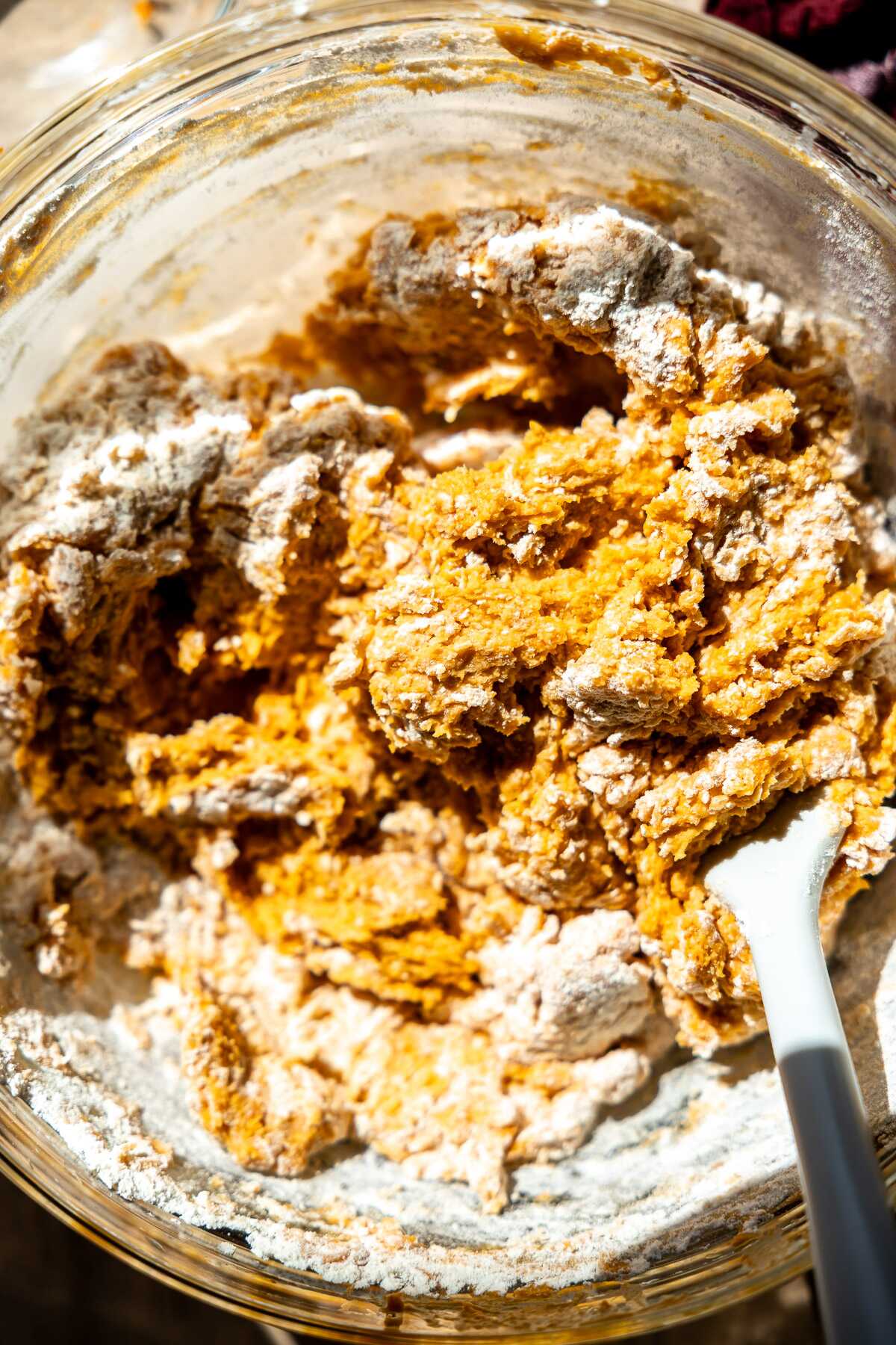 shaggy pumpkin dough in a glass bowl
