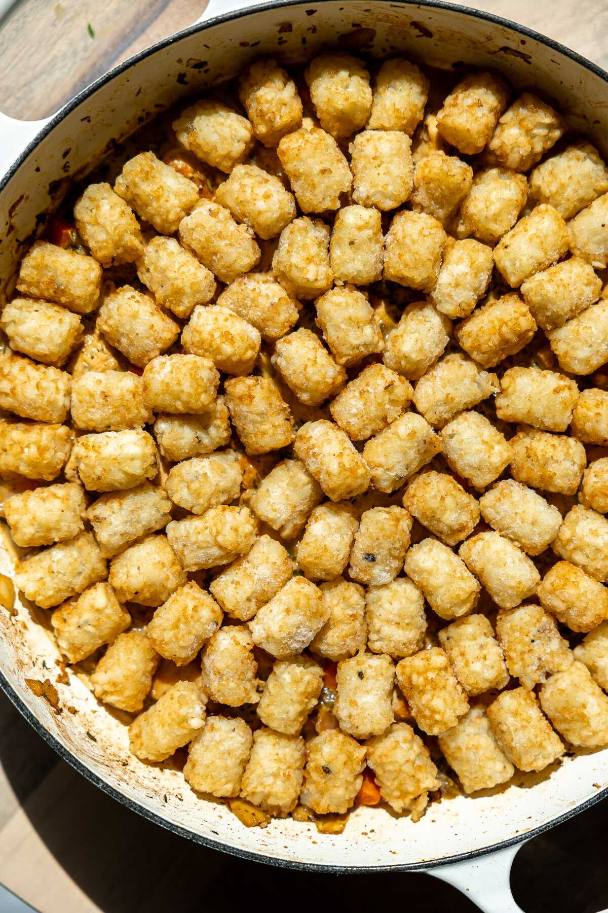Dairy-free chicken tater tot casserole before going into the oven. 