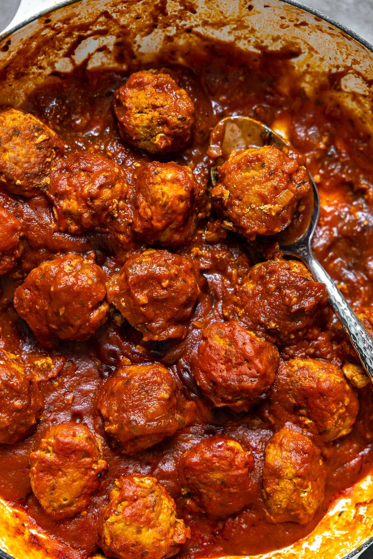 Spicy turkey meatballs that have been simmered in a tomato sauce.