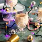 The Clark Griswold Cocktail in a moose mug with Christmas lights around.