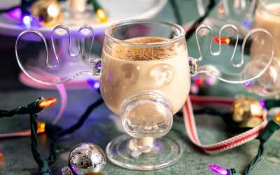 The Clark Griswold Cocktail in a moose mug with Christmas lights around.
