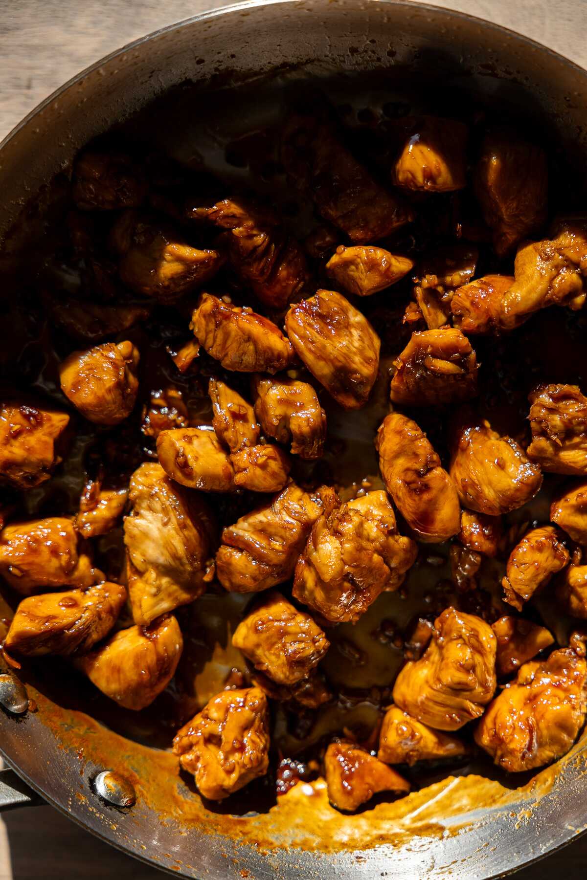 Honey balsamic chicken in a skillet. 